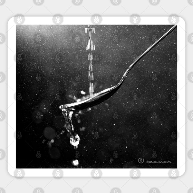 Drops of water fall on a spoon Sticker by Shadow3561